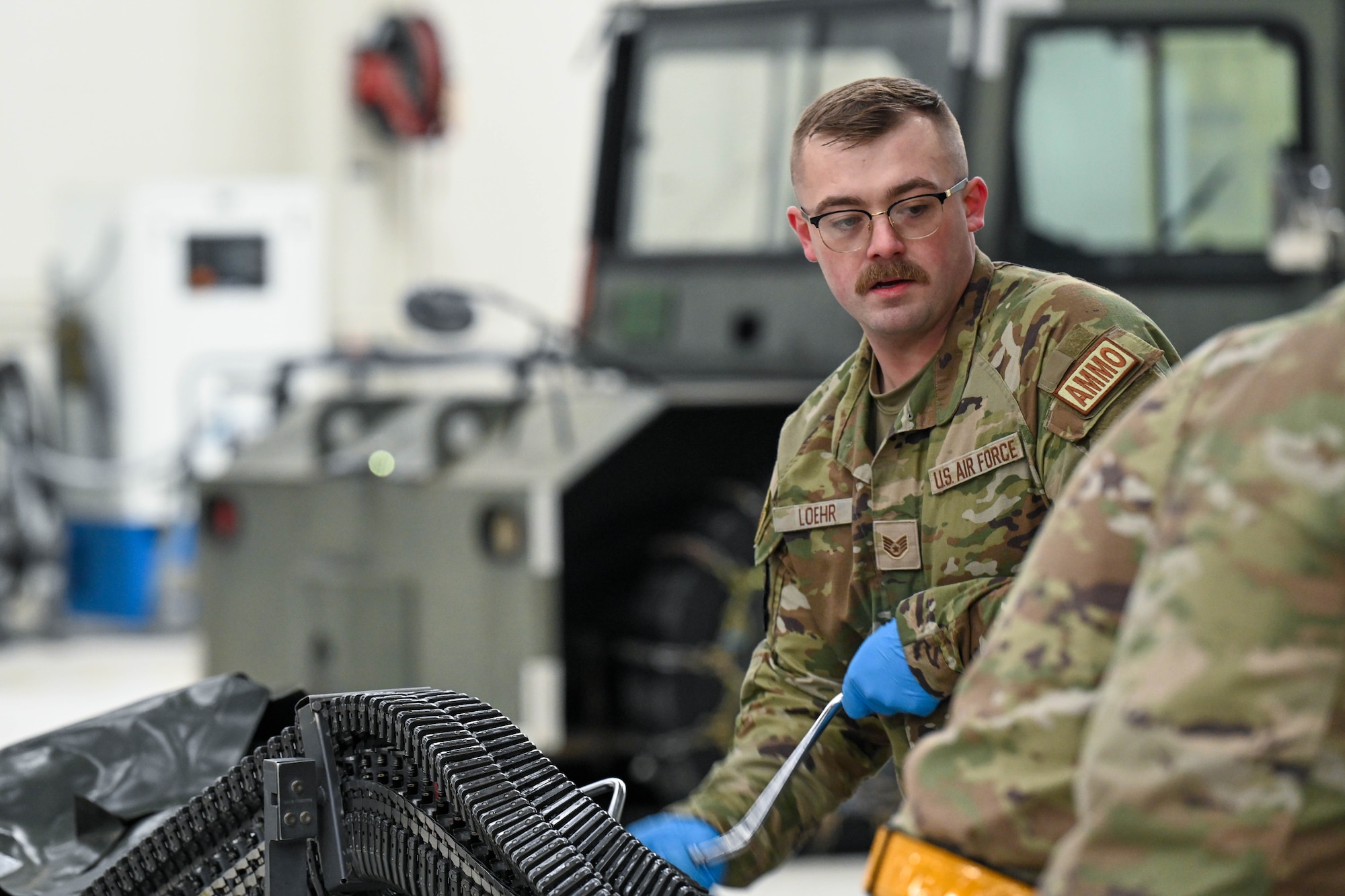 U.S. Air Force Staff Sgt. Colin Loehr, 3rd Munitions Squadron, competing for the 525 Fighter Generation Squadron, participates in the ammo portion of a load competition on Joint Base Elmendorf-Richardson, Alaska, Jan. 10, 2025.