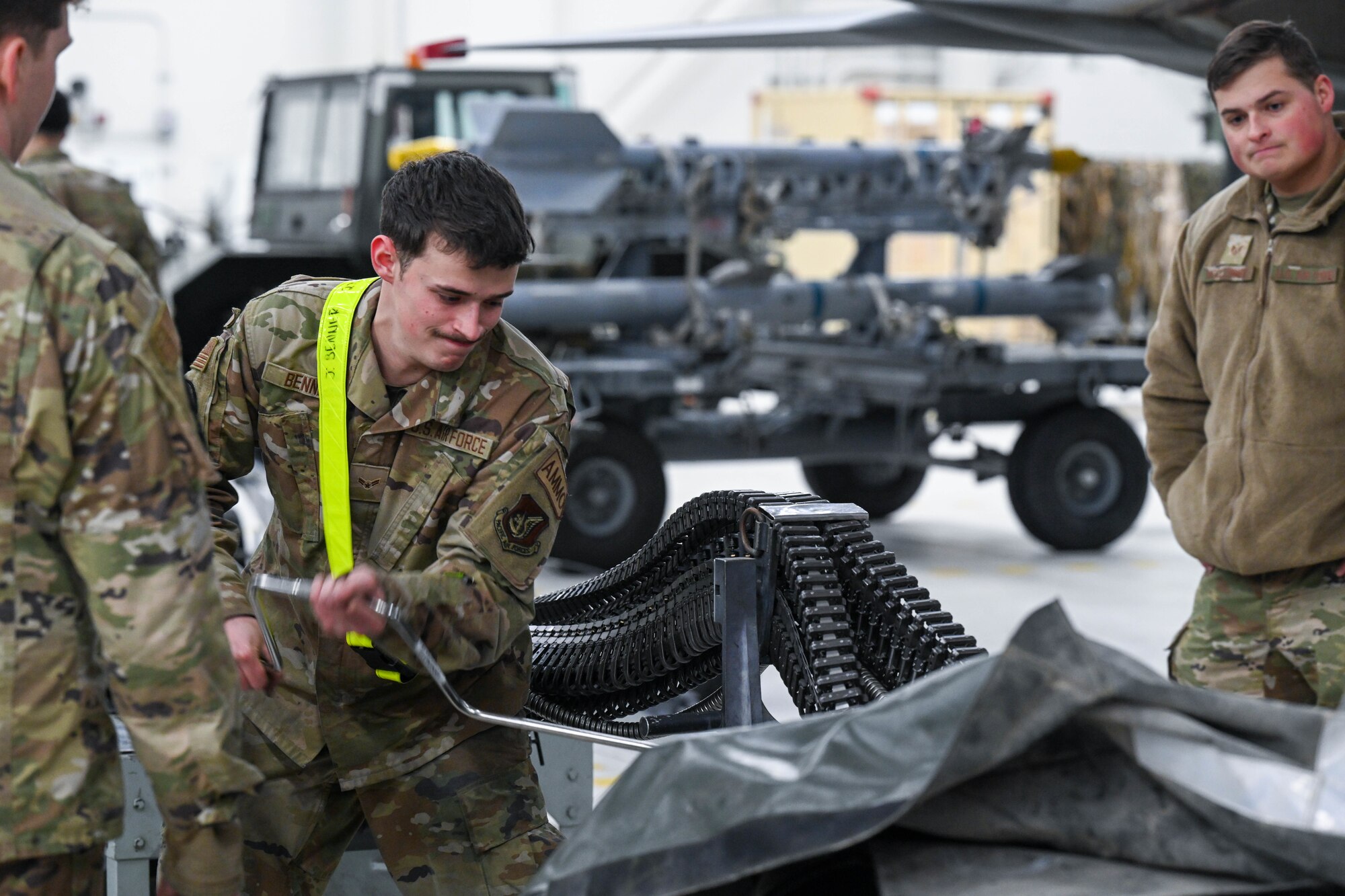 U.S. Air Force Airman 1st Class Jack Benner, 3rd Munitions Squadron, competing for the 525 Fighter Generation Squadron, participates in the ammo portion of a load competition on Joint Base Elmendorf-Richardson, Alaska, Jan. 10, 2025.