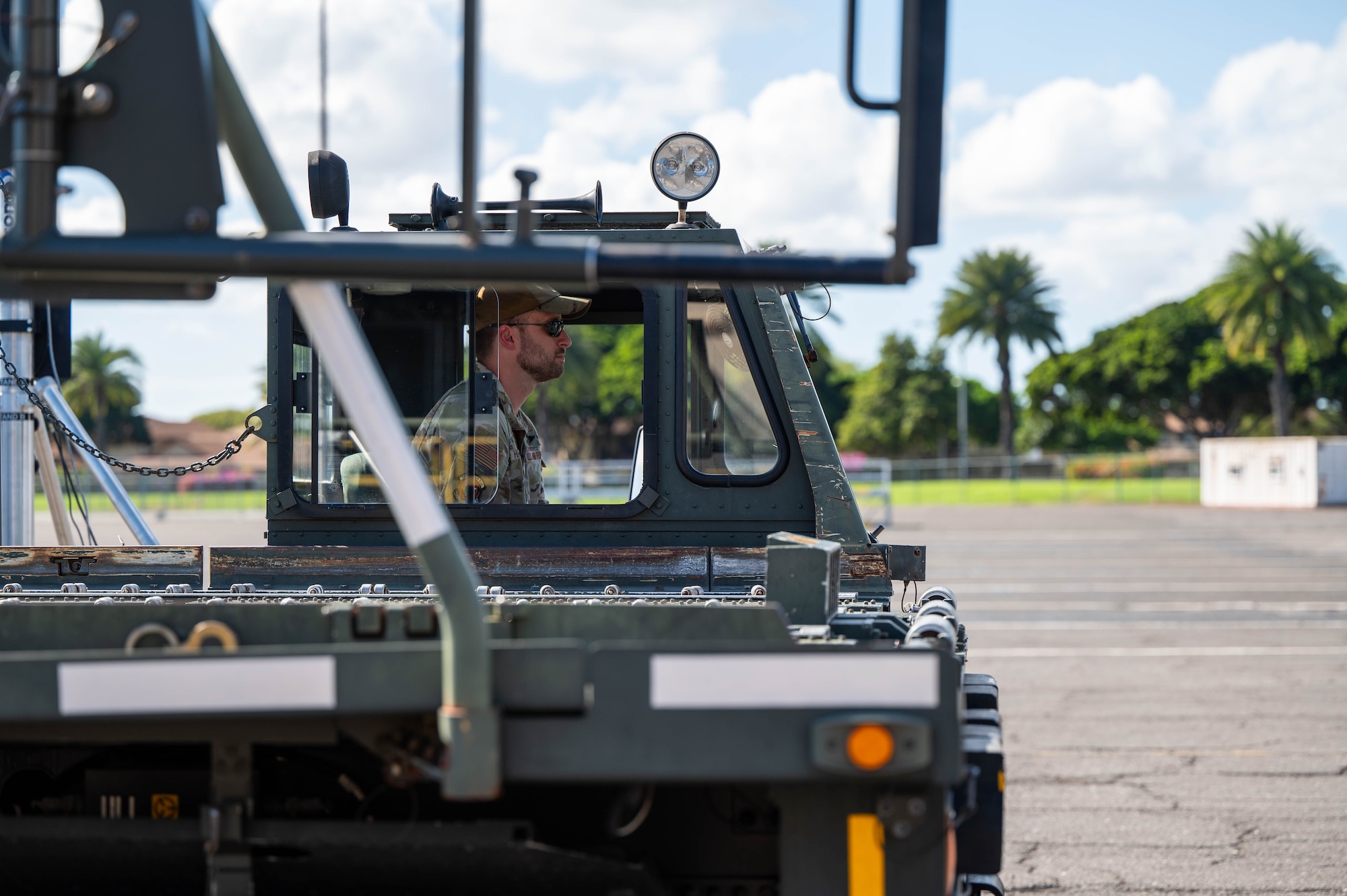 an Airman operates a large vehicle.
