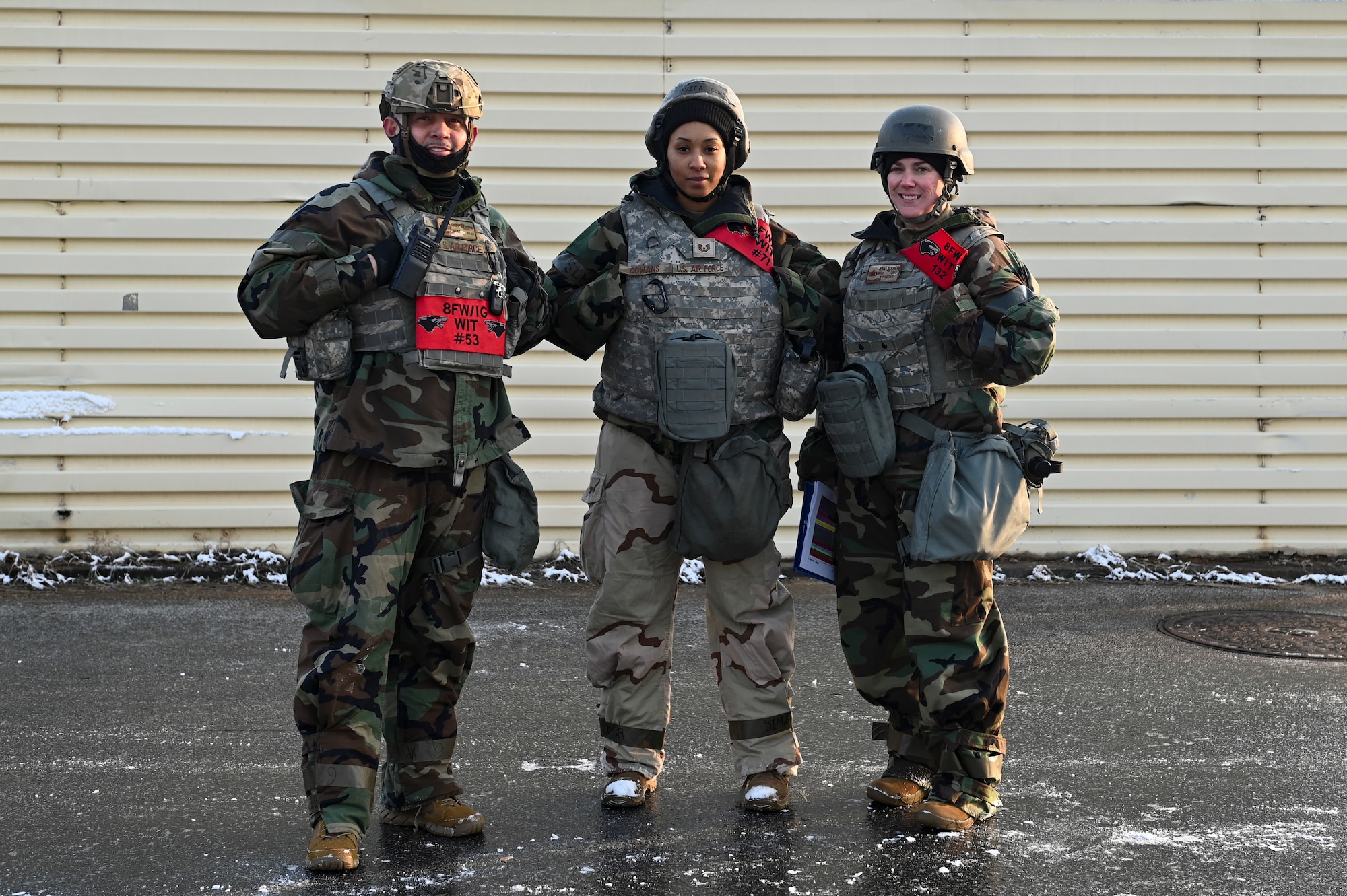 U.S. Air Force Master Sgt. Gany Gamboa, 8th Logistic Readiness Squadron wing inspection team member, Tech. Sgt. Daviea Cowans, 8th LRS WIT member, and U.S. Air Force Master Sgt. Jenna Bodmer, 8th LRS WIT member, poses for a photo during Beverly Pack 25-1.