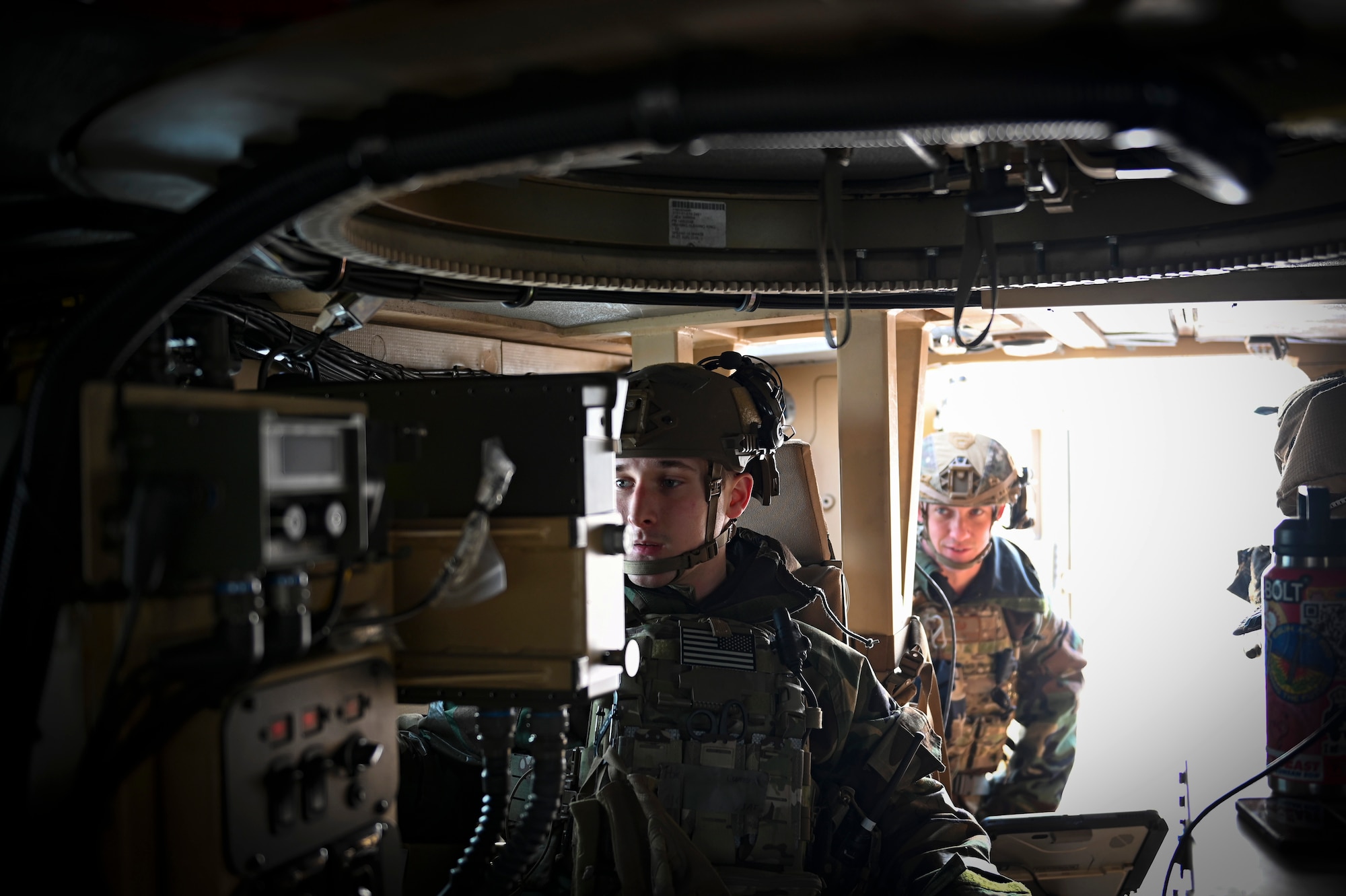 Airman First Class Cameron Poe, 8th Civil Engineer Squadron explosive ordnance disposal secondary team member, views information while Senior Airman Shae Barnard, 8th CES EOD primary team member, awaits details during Beverly Pack 25-1.