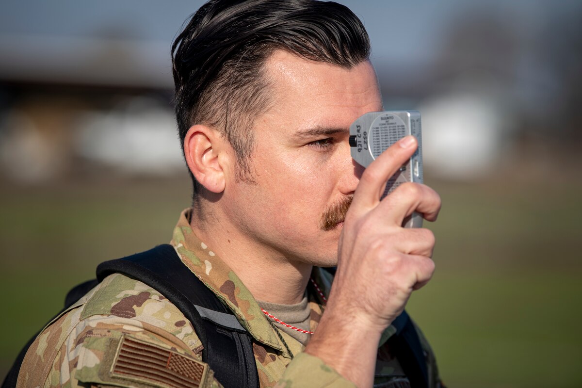 U.S. Air Force Staff Sgt. Dalton Roberts, 921st Contingency Response Squadron operations expeditor, surveys an unprepared flight line in Rio Vista, California, Jan. 10, 2025.