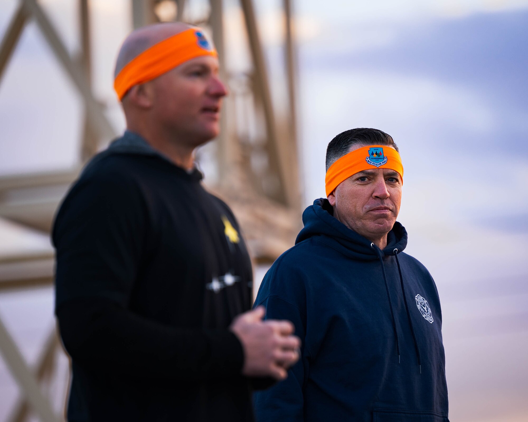 U.S. Air Force Chief Master Sgt. Jason Shaffer (right), 56th Fighter Wing command chief, looks on as U.S. Air Force Brig. Gen. David Berkland (left), 56th Fighter Wing commander, delivers words of encouragement before the start of the Thunderbolt Cup.