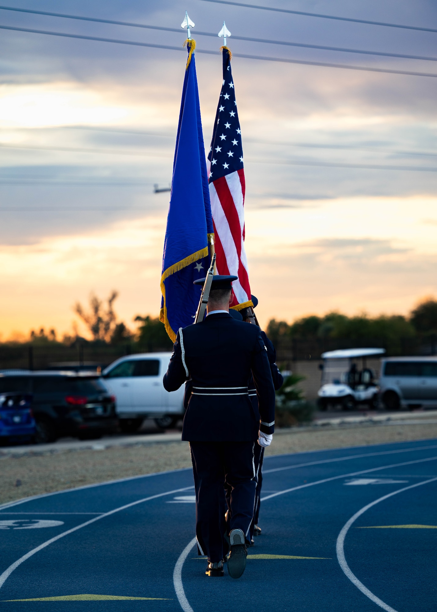 56th Fighter Wing Honor Guard Airmen march in formation.