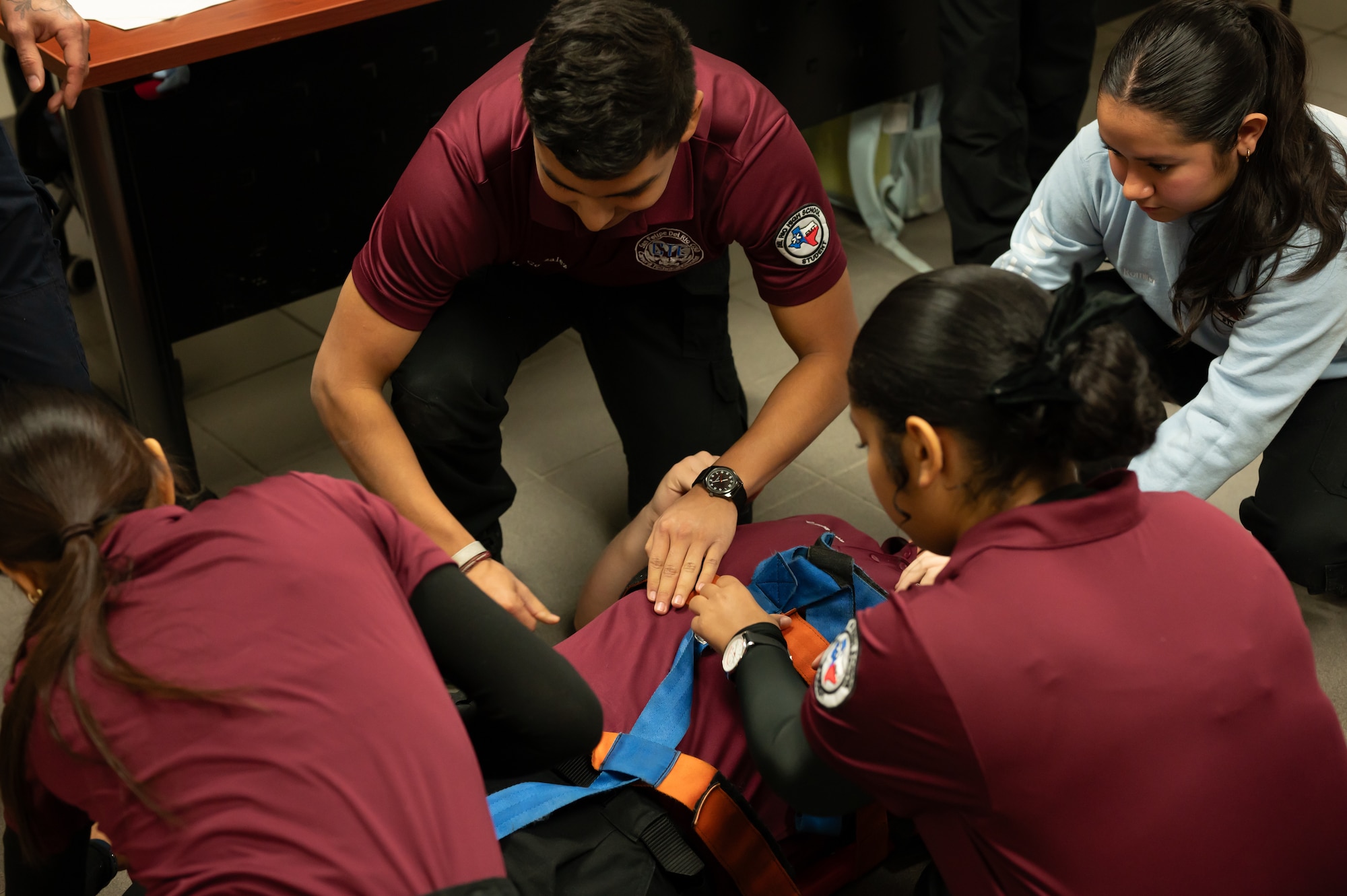 Firefighters from the 47th Civil Engineer Squadron (CES) partnered with the local Del Rio High School Emergency Medical Technician (EMT) class for a hands-on training opportunity here, Jan. 14, 2025.