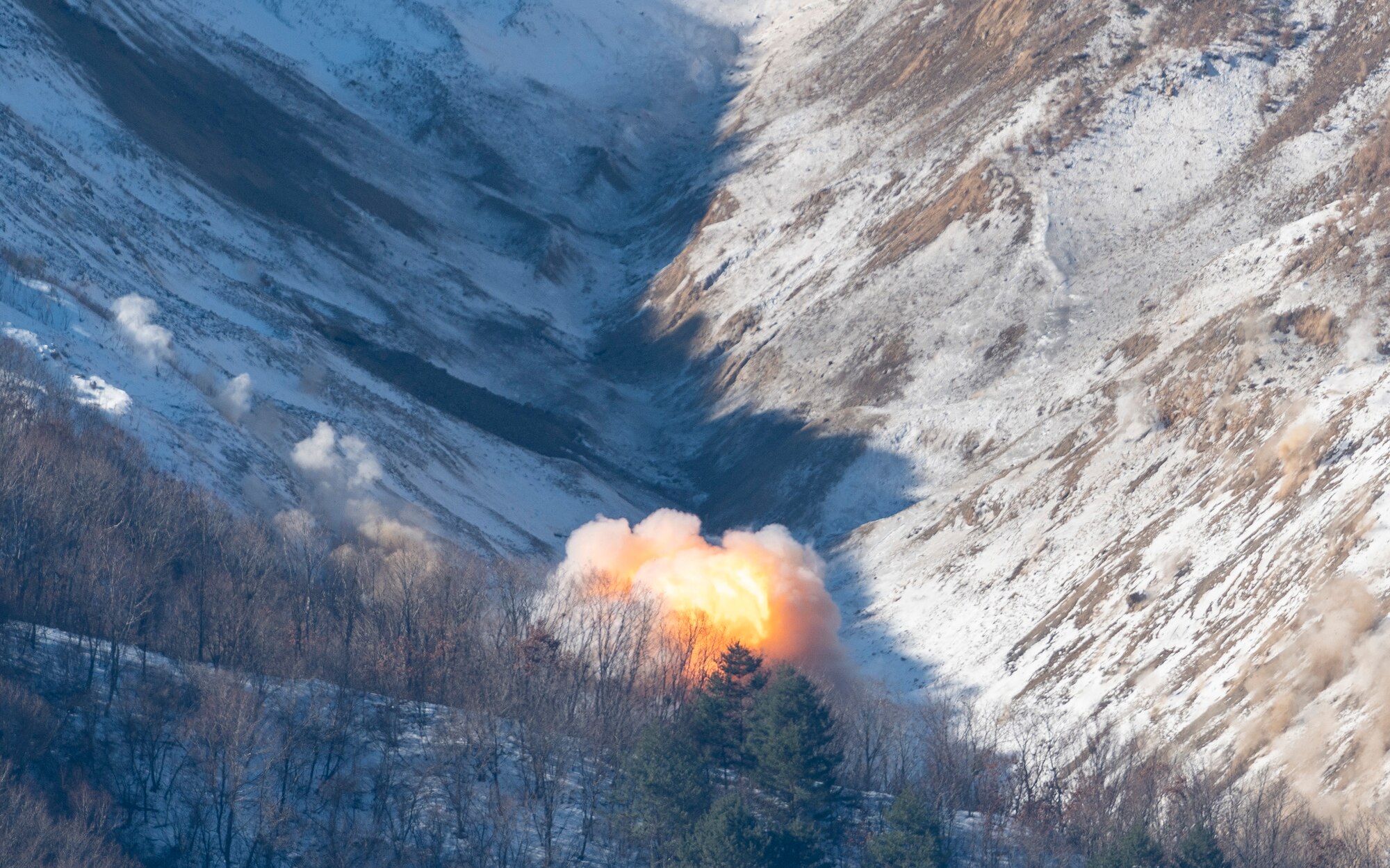 An MK-82 bomb from a 25th Fighter Squadron A-10 Thunderbolt II detonates on a target at Pilsung Range in Gangwon Province, Republic of Korea, Jan. 15, 2025. The 25th FS “Draggins” joined Republic of Korea Air Force assets for range training to enhance readiness and combined strength. (U.S. Air Force photo by Staff Sgt. Ashley N. Mikaio)