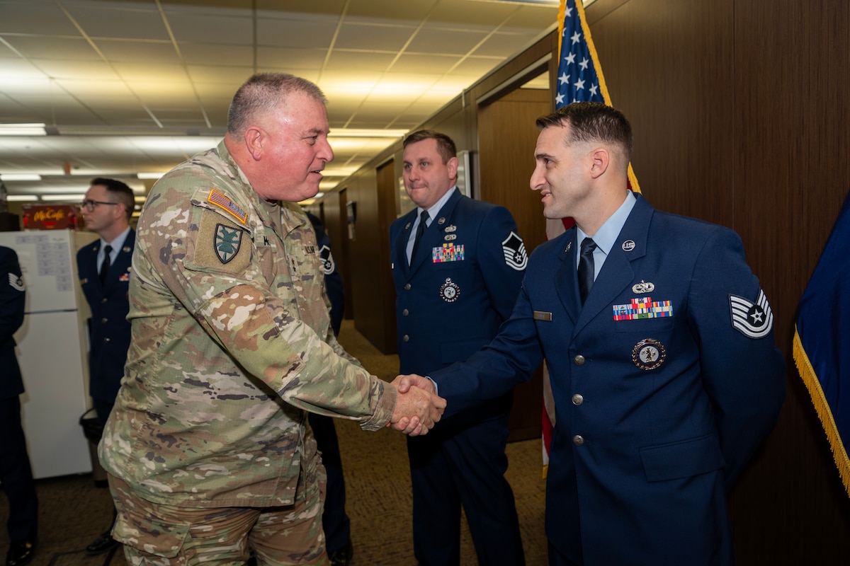 U.S. Army Maj. Gen. R. Van McCarty, the adjutant general for South Carolina, congratulates the dedicated recruiting team of the 169th Fighter Wing at McEntire Joint National Guard Base, South Carolina, Jan. 21, 2025.