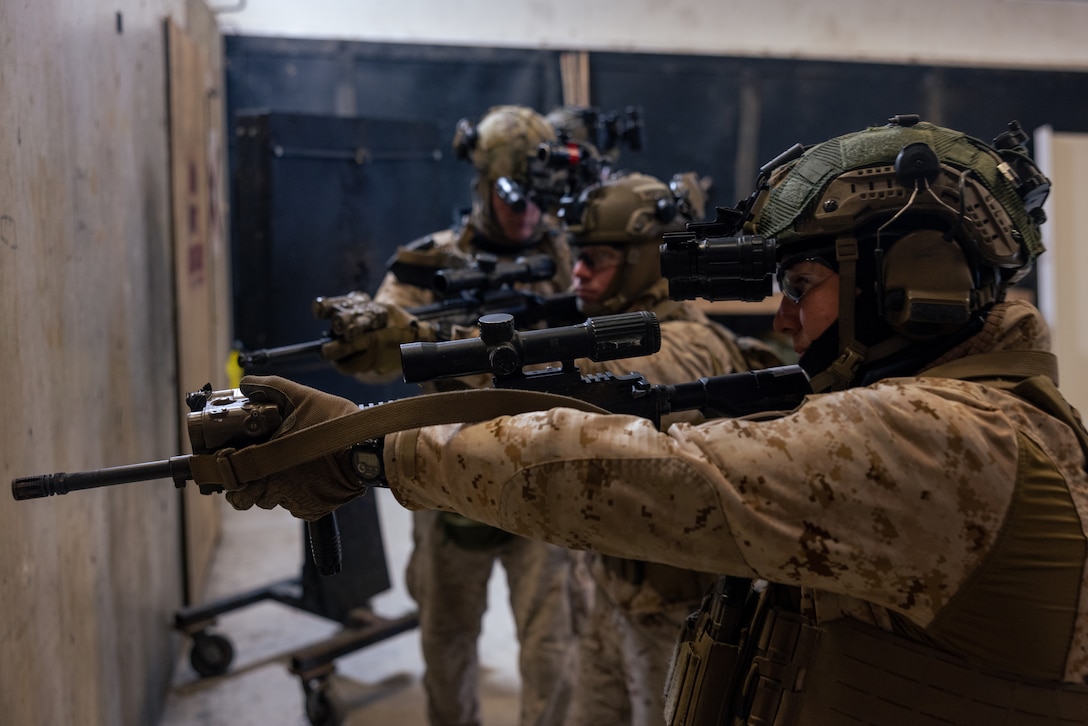 U.S. Marines with 3d Battalion, 6th Marine Regiment, 2d Marine Division, rehearse room clearing procedures during the Expeditionary Operations Training Group (EOTG) close quarters tactics course at Marine Corps Base Camp Lejeune, North Carolina, Jan. 13, 2025. EOTG trains II Marine Expeditionary Force units in preparation for upcoming deployments in support of global combatant commands. (U.S. Marine Corps photo by Lance Cpl. Kyle Baskin)
