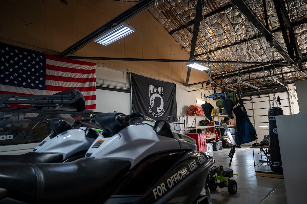 Equipment sits in the survival, evasion, resistance, escape shop at Scott Air Force Base, Dec. 11, 2024. Training provided by the Scott SERE shop includes, water survival training at Lake Carlyle, land navigation, combatives, weapons familiarization, drownproofing, conduct after capture, local area survival, small unit tactics and vehicle maneuvers. (U.S. Air Force photo by Rachel Sansano)