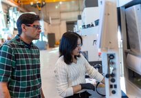 Jim Hook, an Accelerated Training for Defense Manufacturing (ATDM)  instructor, teaches a student how to use a Haas CNC machine at the newly opened National Training Center in Danville, Virginia.