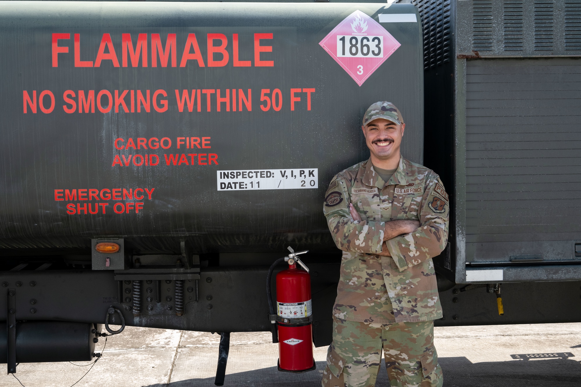 U.S. Air Force Airman 1st Class Jansteven Escribano, a fuels management apprentice with the 156th Logistics Readiness Squadron, Puerto Rico Air National Guard, poses for a photo at Muñiz Air National Guard Base, Carolina, Puerto Rico, Jan. 8, 2025. Escribano, currently in upgrade training, ensures that all wing fuel-related needs are met while also serving as a member of the PRANG Honor Guard and as an augmentee with the 156th Security Forces Squadron, showcasing his versatility and dedication. (U.S. Air National Guard photo by Master Sgt. Victor Vazquez)