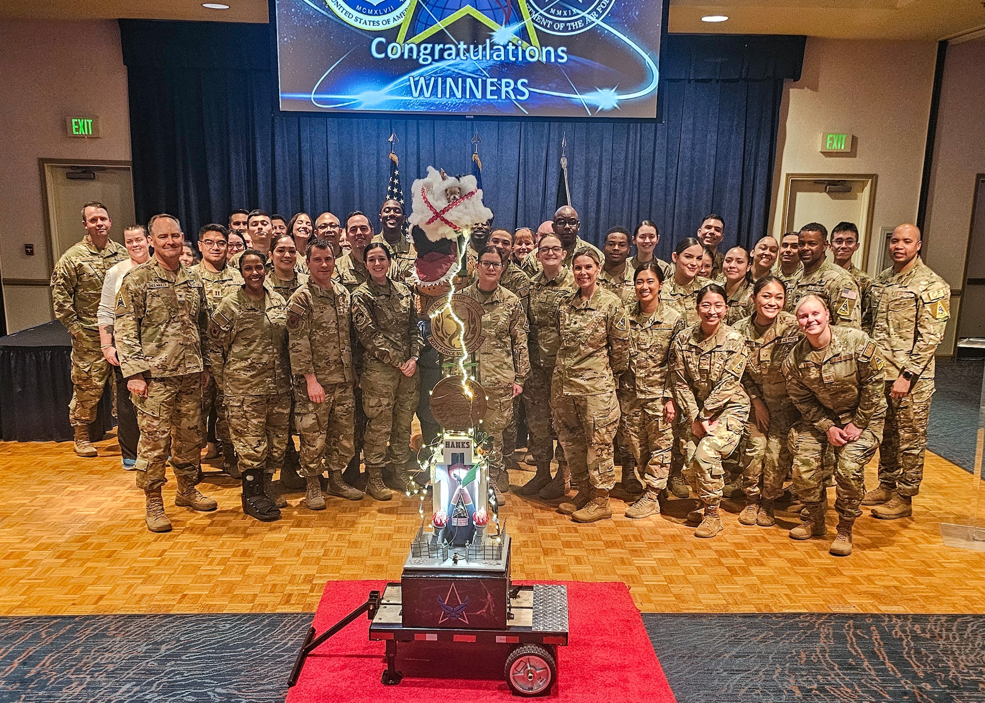30th Medical Group members pose for a group photo after receiving the quarterly Space Launch Delta 30 Spirit Award at Vandenberg Space Force Base.