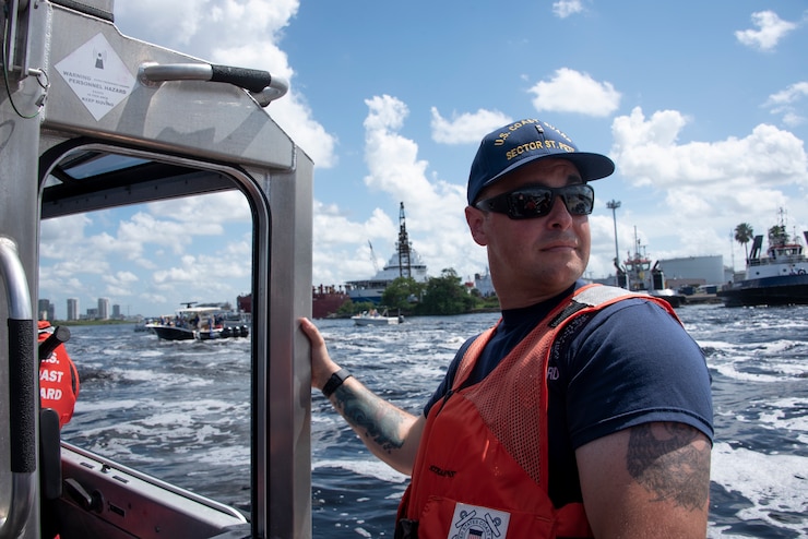 Coast Guard Chief Warrant Officer Gregg Pescuma, on a 29-foot Response Boat – Small II from Coast Guard Station St. Petersburg, surveys the waterway during Tampa Bay Lightning’s Stanley Cup Championship Boat Parade, Tampa, Florida, July 12, 2021. The Coast Guard conducted the patrol in collaboration with its interagency partners to provide security, ensure the movement of vessels in the parade, and keep mariners safe during the celebration. (U.S. Coast Guard photo by Petty Officer 1st Class Lisa Ferdinando)