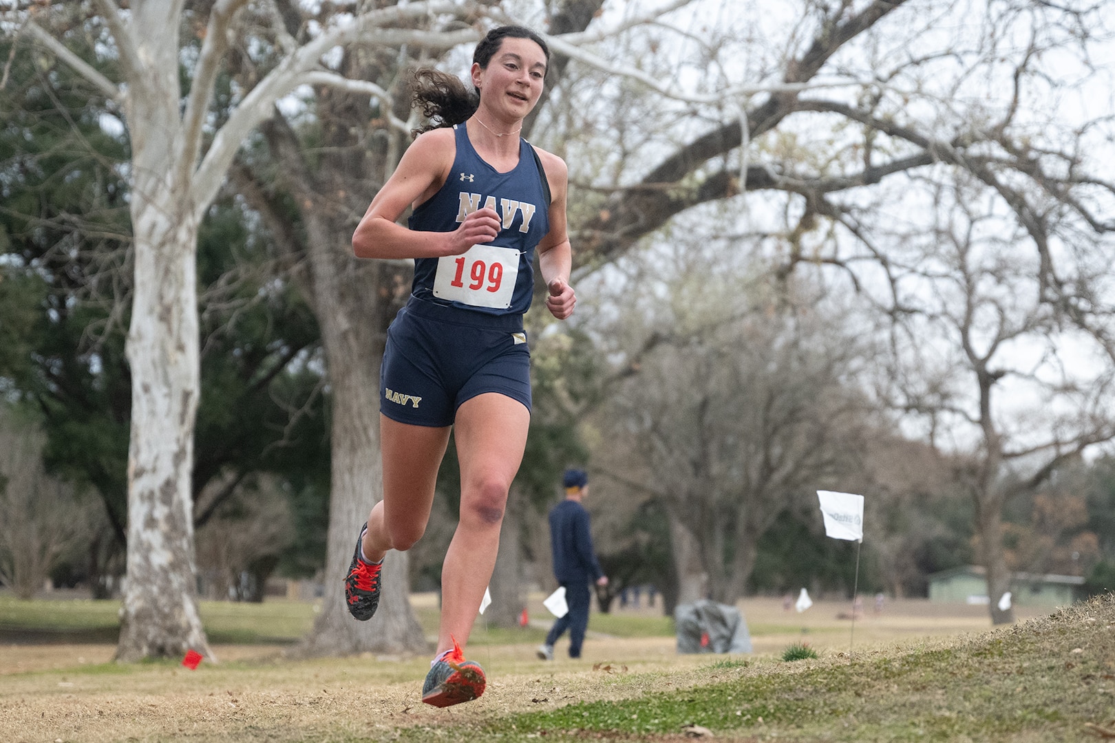 Navy Ensign Elizabeth Sullivan races to second place in the women’s divsion of the 2025 Armed Forces Men’s and Women’s Cross Country Championship at Windcrest Golf Club in Windcrest, Texas, on Jan. 25, 2025. (DoD photo by EJ Hersom)