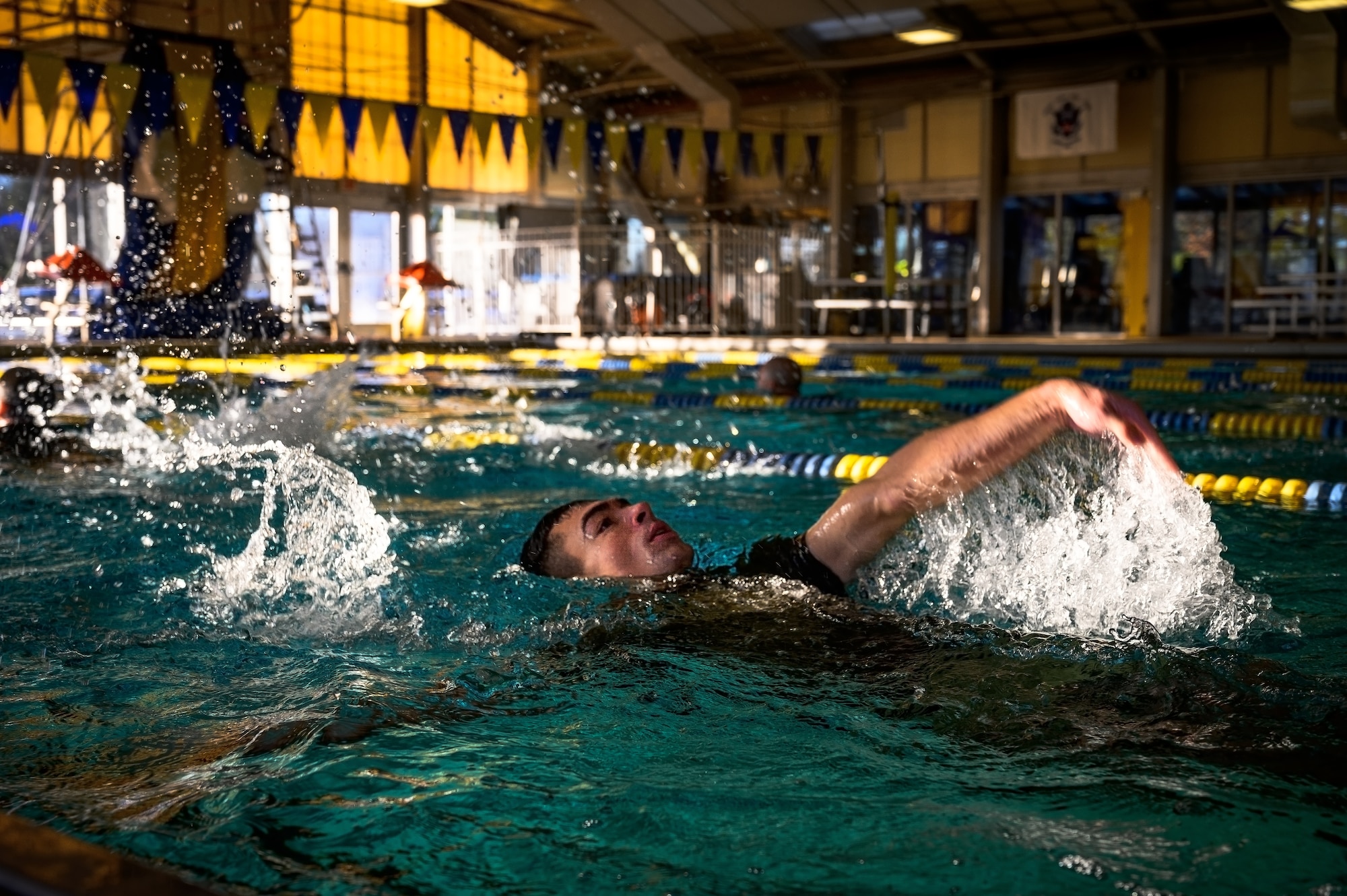 U.S. Marine Corps Cpl. Hagen Delakowski, Marine Aircraft Group 49 Marine Corps Martial Arts Program trainee, performs water-based exercises at Joint Base McGuire-Dix-Lakehurst, N.J., Jan. 10, 2025. MCMAP is a combat system that combines existing and new hand-to-hand and close quarters combat techniques with morale, team-building functions and instruction in the warrior ethos. The techniques used by MCMAP vary in degrees of lethality allowing members to qualify and master up to six disciplines through continuation in the program. (U.S. Air Force photo by Senior Airman Matt Porter)