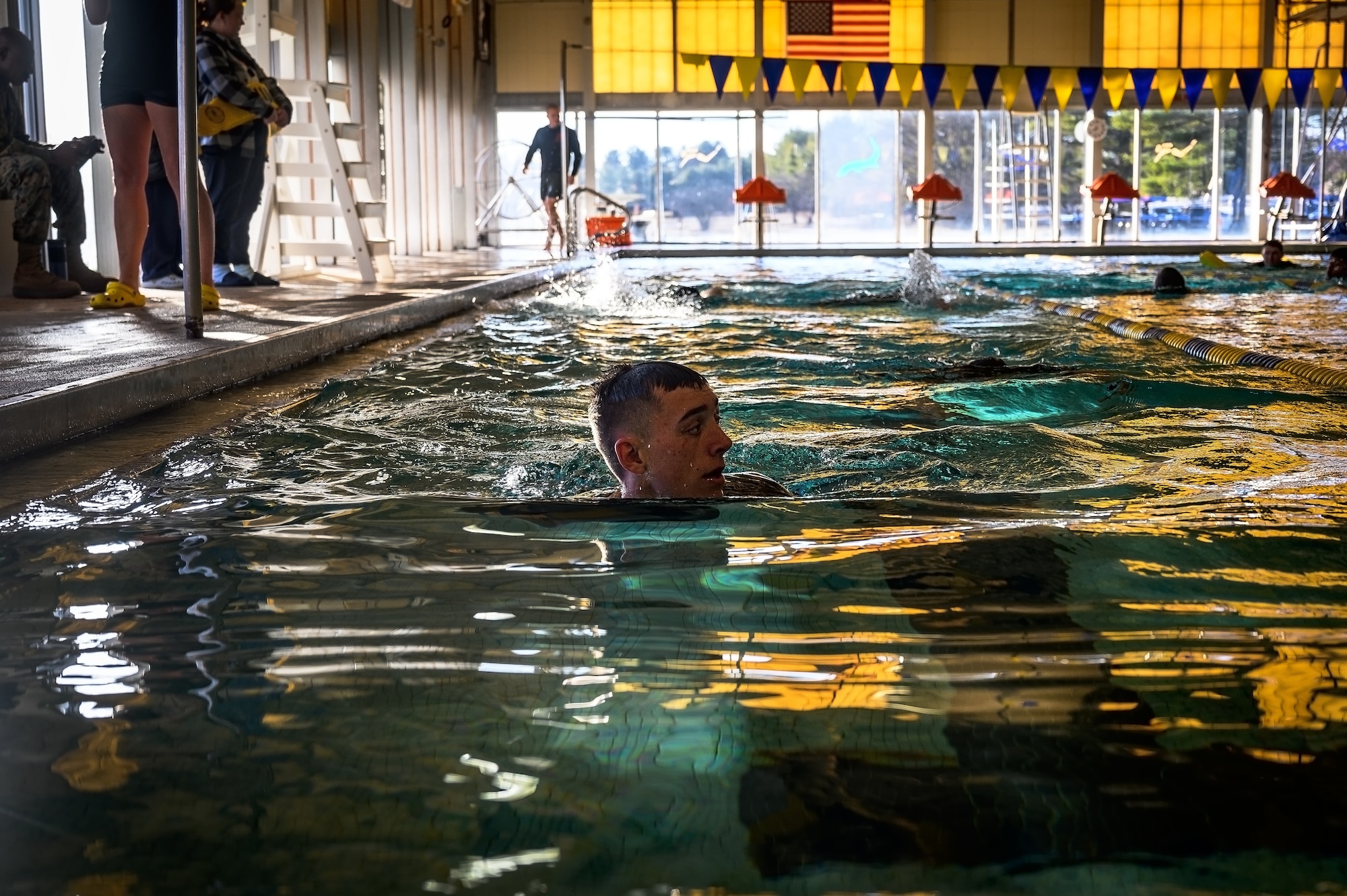 U.S. Marine Corps Cpl. Tyler Gilchrist, Marine Aircraft Group 49 Marine Corps Martial Arts Program trainee, performs water-based exercises at Joint Base McGuire-Dix-Lakehurst, N.J., Jan. 10, 2025. MCMAP is a combat system that combines existing and new hand-to-hand and close quarters combat techniques with morale, team-building functions and instruction in the warrior ethos. The techniques used by MCMAP vary in degrees of lethality allowing members to qualify and master up to six disciplines through continuation in the program. (U.S. Air Force photo by Senior Airman Matt Porter)