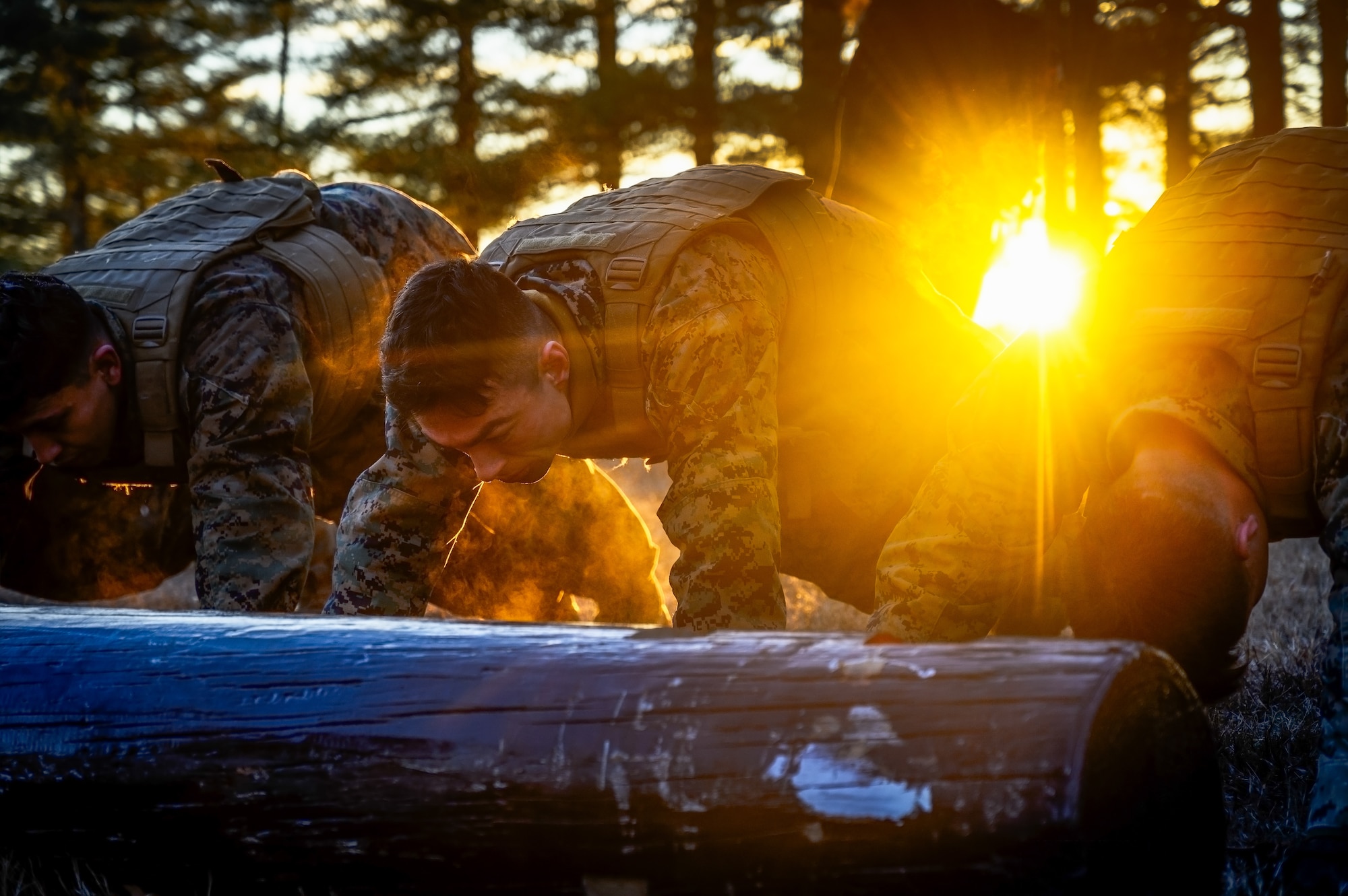 U.S. Marines assigned to Marine Aircraft Group 49 perform an exercise circuit during the Marine Corps Martial Arts Program at Joint Base McGuire-Dix-Lakehurst, N.J., Jan. 16, 2025. MCMAP is a combat system that combines existing and new hand-to-hand and close quarters combat techniques with morale, team-building functions and instruction in the warrior ethos. The techniques used by MCMAP vary in degrees of lethality allowing members to qualify and master up to six disciplines through continuation in the program. (U.S. Air Force photo by Senior Airman Matt Porter)