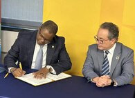 Naval Surface Warfare Center, Philadelphia Division (NSWCPD) Technical Director Nigel C. Thijs, SES and Dr. Giuseppe R. Palmese, Dean, Henry M. Rowan College of Engineering at Rowan University renewed their formal Education Partnership Agreement (EPA) during a signing ceremony at the Glassboro, New Jersey campus on Jan. 22, 2025. (U.S. Navy Photo by Gary Ell/Released)