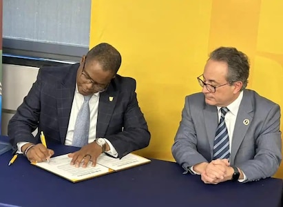 Naval Surface Warfare Center, Philadelphia Division (NSWCPD) Technical Director Nigel C. Thijs, SES and Dr. Giuseppe R. Palmese, Dean, Henry M. Rowan College of Engineering at Rowan University renewed their formal Education Partnership Agreement (EPA) during a signing ceremony at the Glassboro, New Jersey campus on Jan. 22, 2025. (U.S. Navy Photo by Gary Ell/Released)