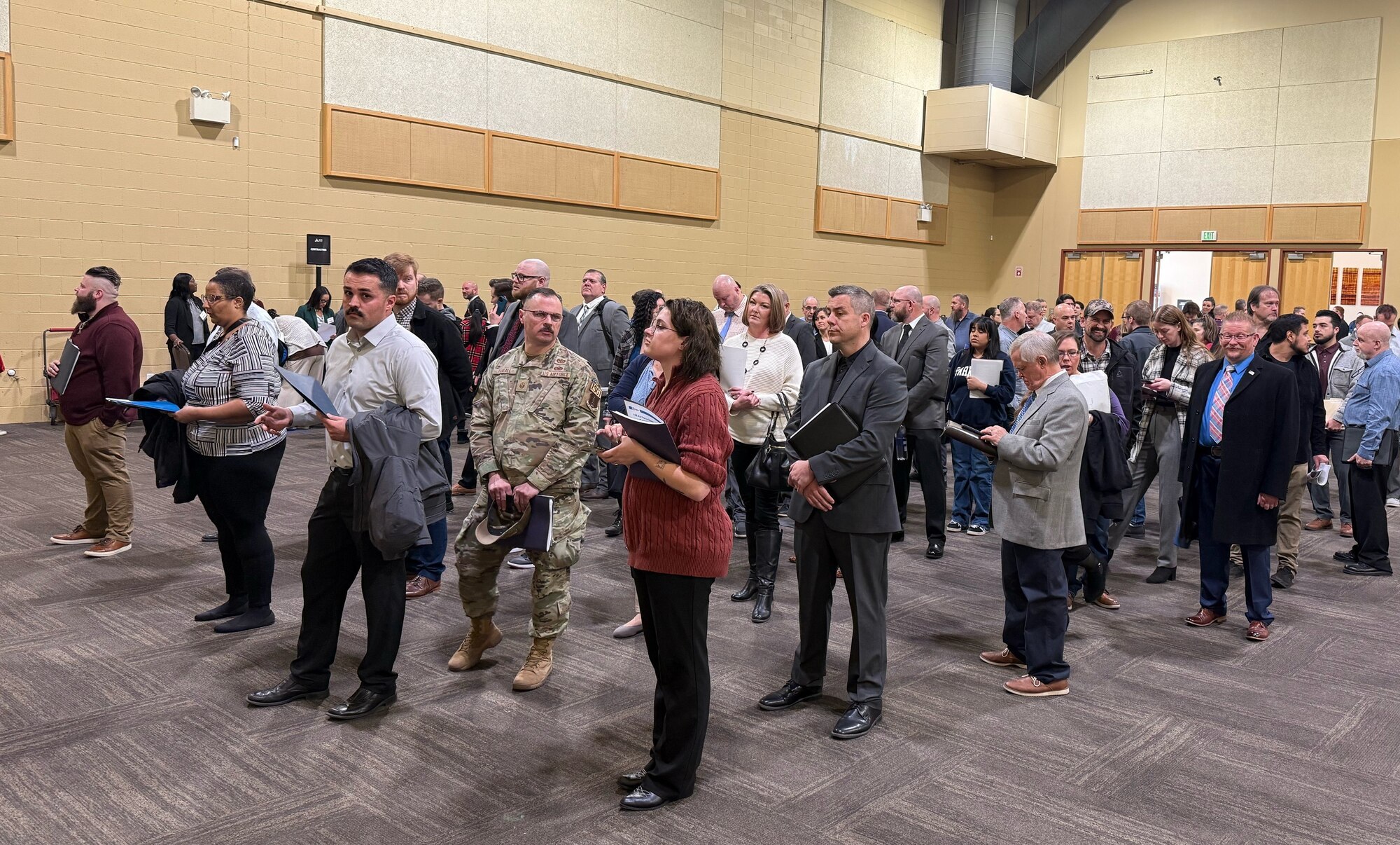 Recruiters from Hill Air Force Base meet with job seekers at a hiring event Jan. 16 at the Davis Conference Center. Job seekers were able to meet with representatives from several base organizations and multiple candidates received job offers. (U.S. Air Force photo by Kendahl Johnson)
