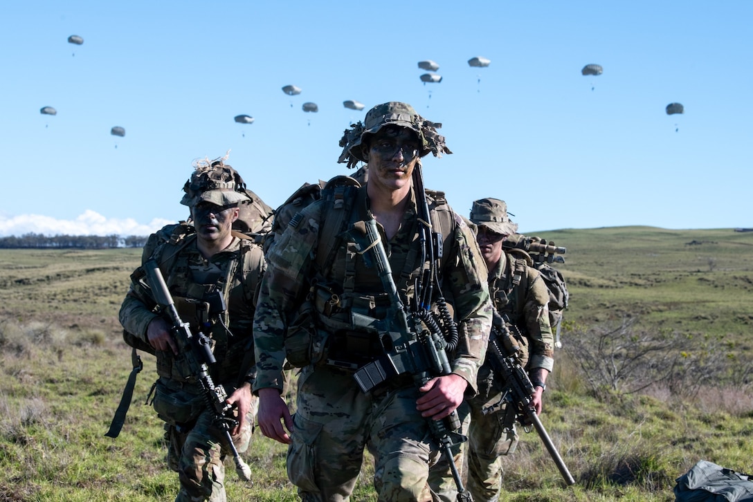 U.S. Army Soldiers from 3rd Battalion, 509th Parachute Infantry Regiment arrive at Pohakuloa Training Area, Hawaii, Oct. 7, 2024, during the Joint Pacific Multinational Readiness Center 25-1.