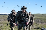 U.S. Army Soldiers from 3rd Battalion, 509th Parachute Infantry Regiment arrive at Pohakuloa Training Area, Hawaii, Oct. 7, 2024, during the Joint Pacific Multinational Readiness Center 25-1.