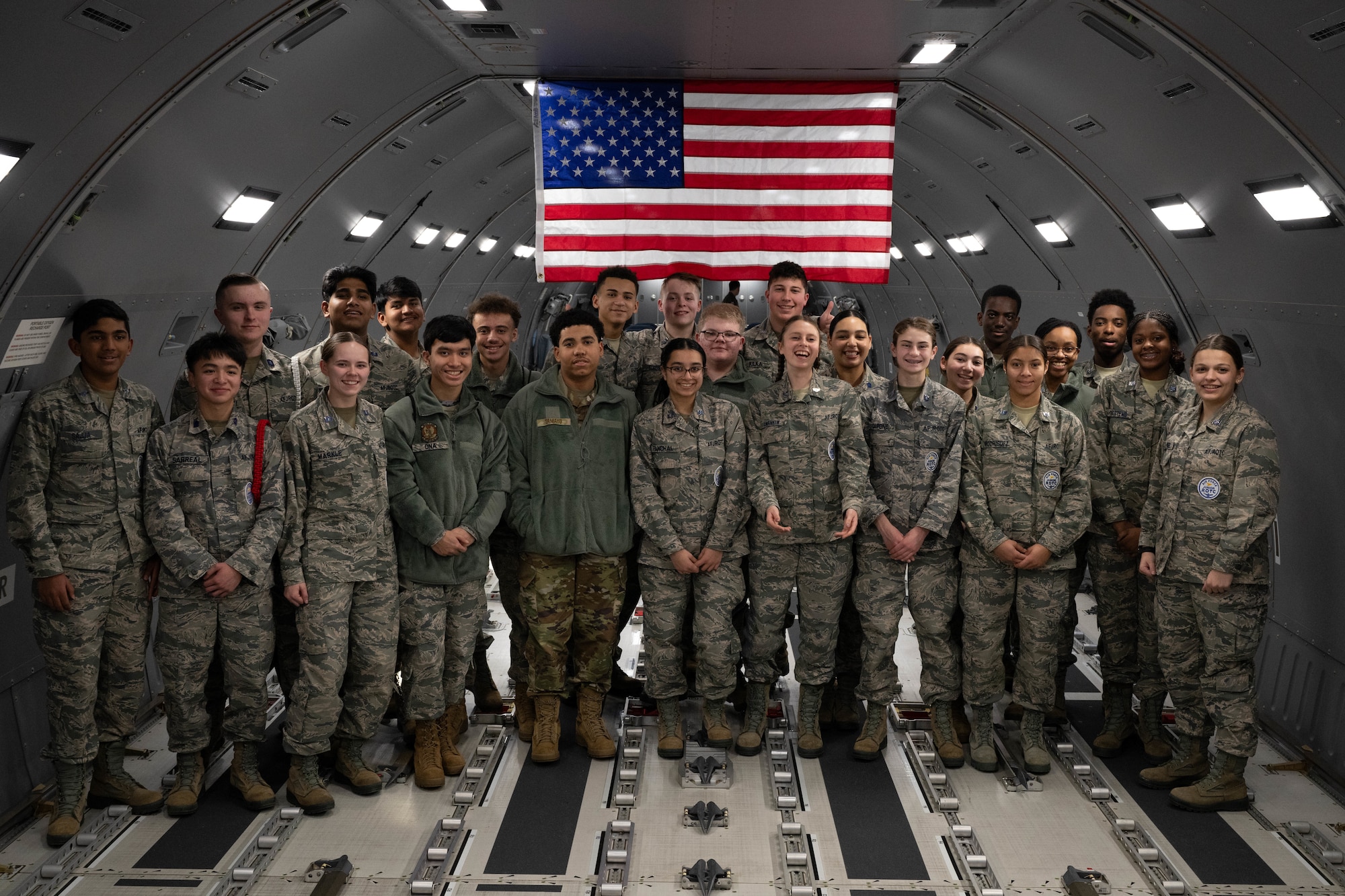 Students from Mount Olive High School Junior Reserve Officers' Training Corps pose for a photo inside of a KC-46A Pegasus aircraft at Joint Base McGuire-Dix-Lakehurst, N.J., Jan. 14, 2025. JROTC Students from Mount Olive High School flew on the 2nd Aerial Refueling Squadron’s KC-46A as part of the Aviation Inspiration Mentorship program to enhance their understanding of the Air Force’s aviation mission. (U.S. Air Force photo by Senior Airman Aidan Thompson)