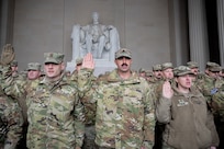 Idaho Army National Guard Soldiers assigned to Joint Task Force District of Columbia (JTF-DC) recite the oath of enlistment in front of the Lincoln Memorial  in Washington D.C., Jan. 21, 2025. Approximately 8,000 National Guard service members from approximately 40 states and territories comprise JTF-DC to support the 60th Presidential Inauguration, continuing a legacy that began in 1789 when their predecessors escorted George Washington to the first inauguration. At the request of civil authorities, these National Guard service members provide critical support such as crowd management, traffic control points, CBRN response, civil disturbance response and sustainment operations. Their expertise and seamless collaboration with interagency partners help ensure a safe and peaceful transition of power during this historic event.