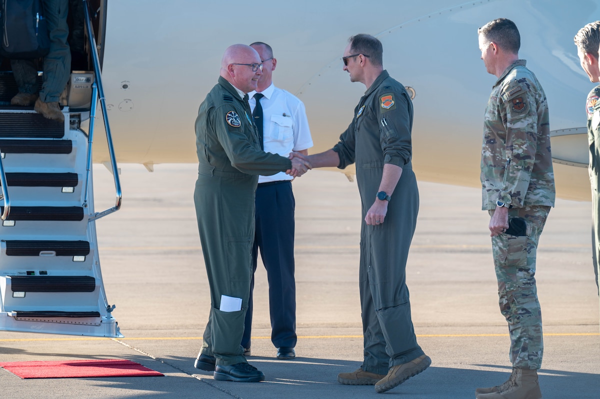 U.S. Air Force Col. Matthew Johnston (center-right), 56th Fighter Wing deputy commander, greets Belgian Air and Space Component Maj. Gen. Theirry Dupont (left), BASC commander, as he arrives at Luke Air Force Base, Arizona,