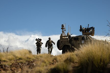 U.S. Marines with 3d Marine Division run to a firing point with a FIM-92 Stinger during a training exercise at Pohakuloa Training Area, Hawaii, Jan. 25, 2025. The training exercise taking place at PTA mirrors a Service Level Training Exercise by setting conditions for 3d MLR and its subordinate battalions to go forward to the Philippines in support of Exercise Balikatan 25 and Kamandag 9 this summer. (U.S. Marine Corps photo by Sgt. Jacqueline C. Parsons)