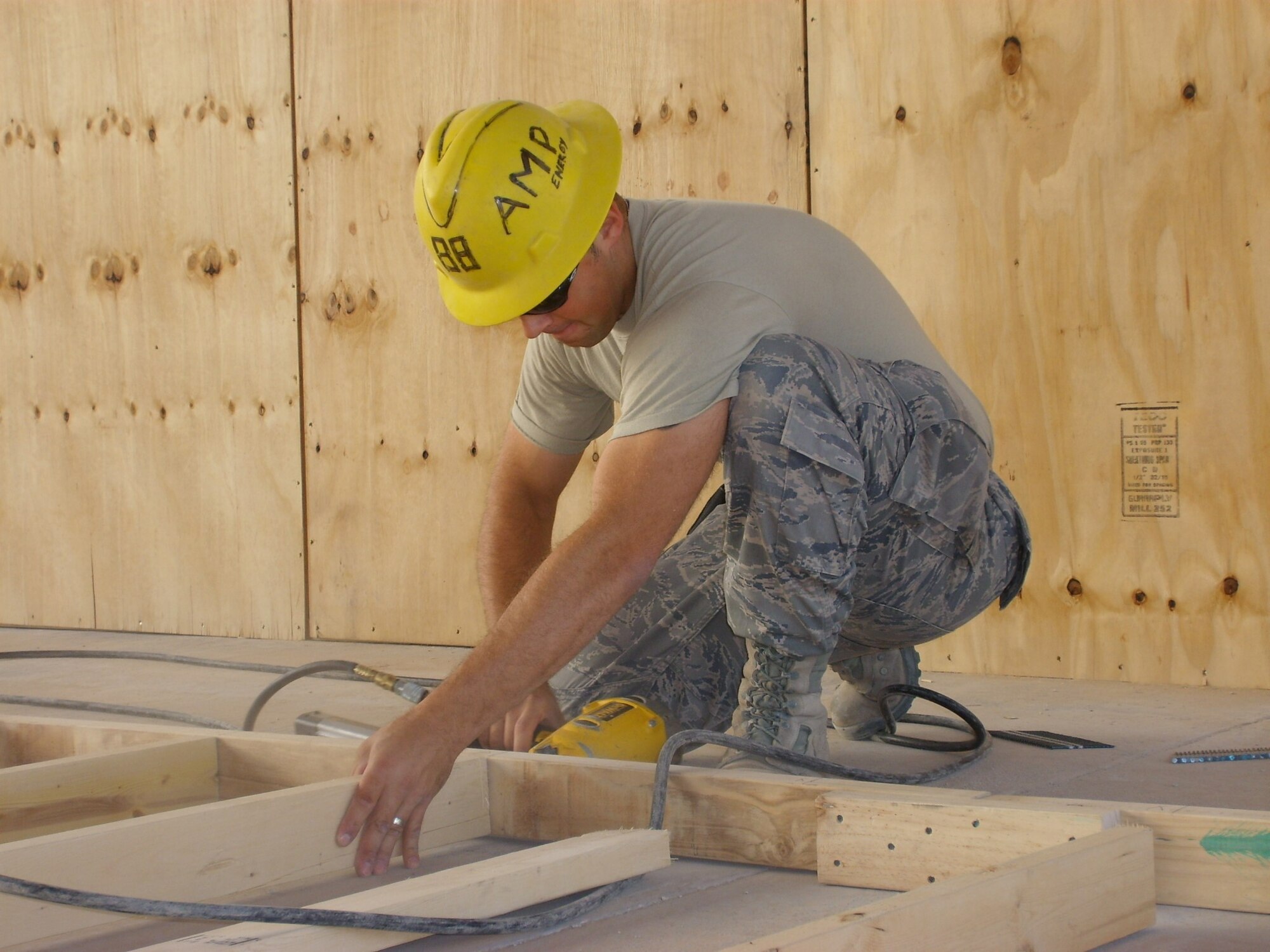 U.S. Air Force Chief Master Sgt. Luke Lucas, 325th Fighter Wing command chief, builds an interior frame as a staff sergeant assigned to the 732nd Expeditionary Civil Engineer Squadron, Detachment 3, in Baghdad, Iraq, 2008.
