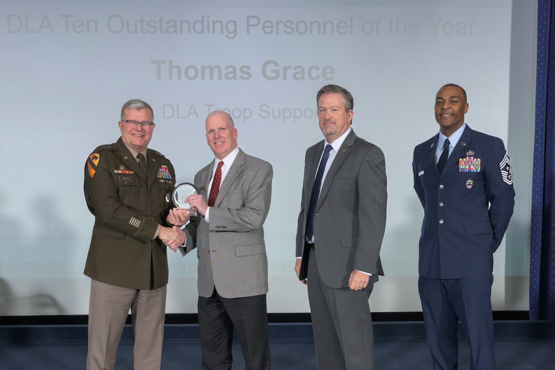 Pictured are DLA Director Army Lt. Gen. Mark Simerly, left; Thomas Grace, Construction & Equipment deputy director at DLA Troop Support and one of the agency’s top 10 employees; DLA Vice Director Brad Bunn; and DLA Senior Enlisted Leader Air Force Command Chief Master Sgt. Alvin Dyer.