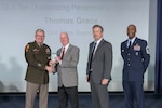 Pictured are DLA Director Army Lt. Gen. Mark Simerly, left; Thomas Grace, Construction & Equipment deputy director at DLA Troop Support and one of the agency’s top 10 employees; DLA Vice Director Brad Bunn; and DLA Senior Enlisted Leader Air Force Command Chief Master Sgt. Alvin Dyer.