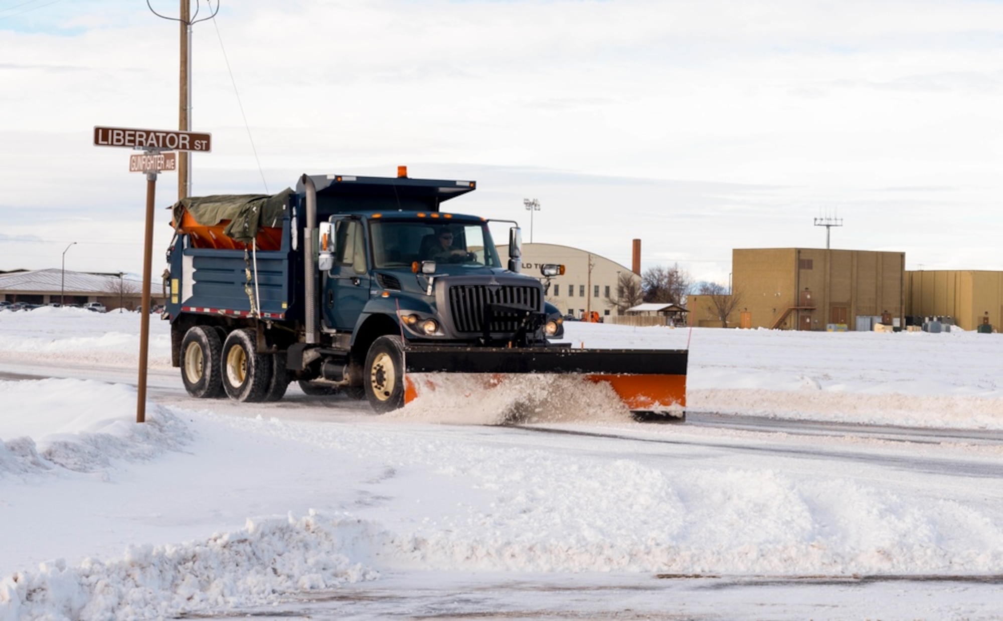 A snowplow clears the roads of Mountain Home Air Force Base, Idaho, January 23, 2017