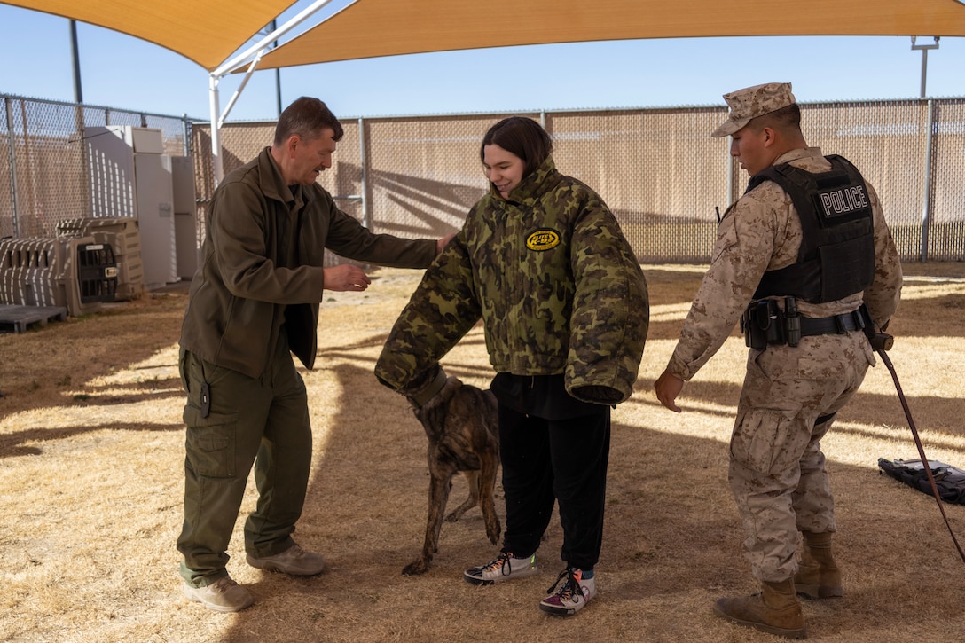 Students from Silver Valley High School's Criminal Justice program observed and joined in on demonstrations with the Provost Marshall's Office and Special Reaction Team aboard Marine Corps Logistics Base Barstow, California, January 23. Students were able to learn about different weapons utilized by PMO and SRT, along with interact with the K9's at their obstacle course and during bite training.