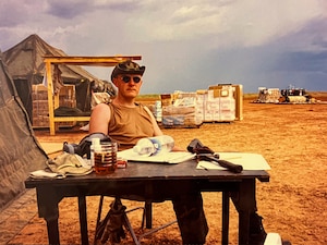Man sits at desk
