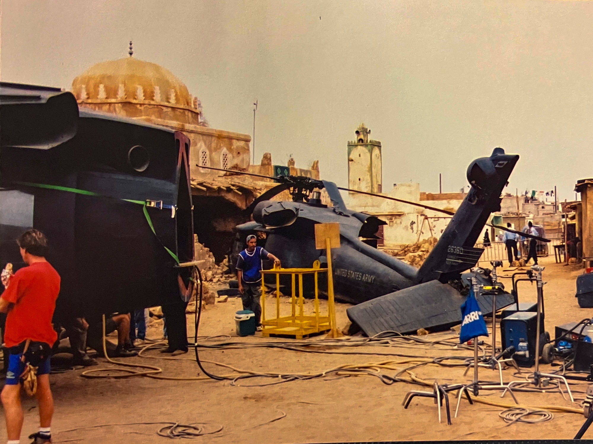Men work on movie set.