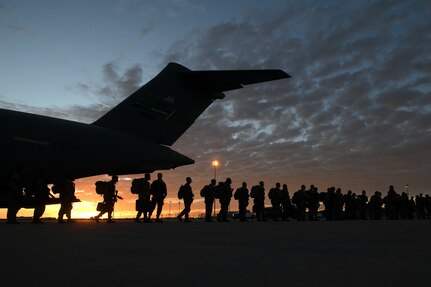 Soldiers departing aircraft