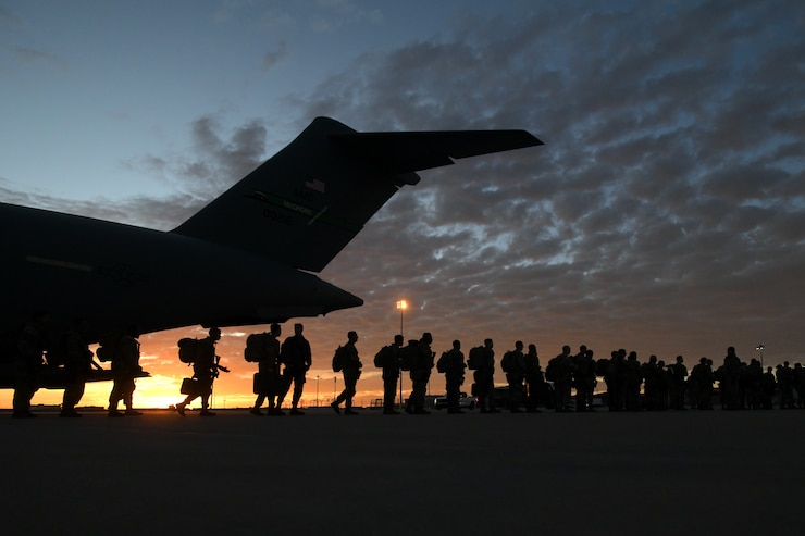Soldiers departing aircraft