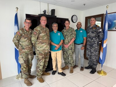 MAJURO, Republic of the Marshall Islands (Jan. 23, 2025) Commander, Joint Task Force-Micronesia (JTF-M) Rear Adm. Greg Huffman (center) meets with Oceanic Chief Fisheries Officer Beau Bigler and Marshall Islands Marine Resources Authority (MIMRA) Director Glen Joseph at MIMRA in Majuro, Jan. 23, 2025.