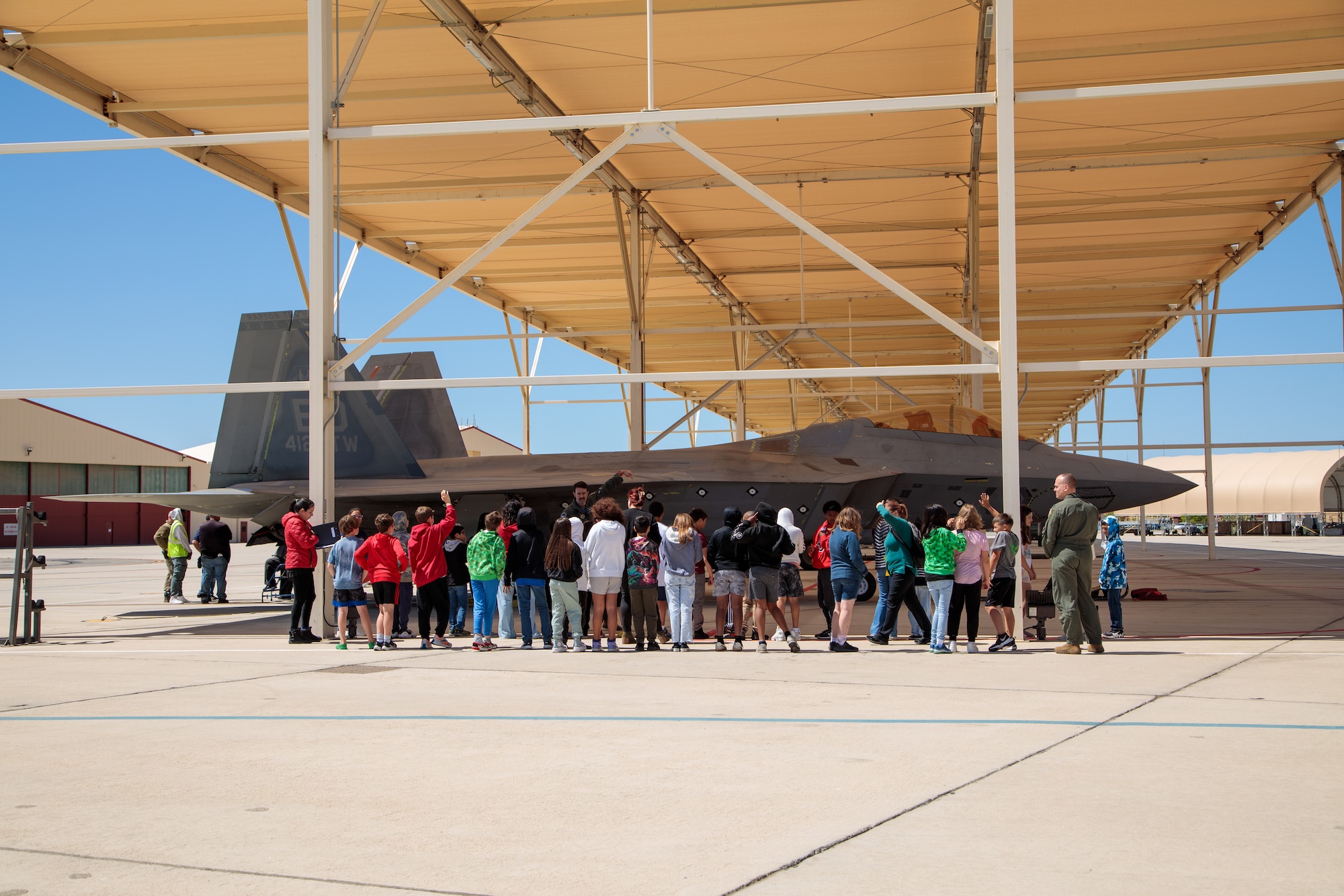 STARBASE students get up close and personal with F-22s during a tour during the fall 2024 semester.