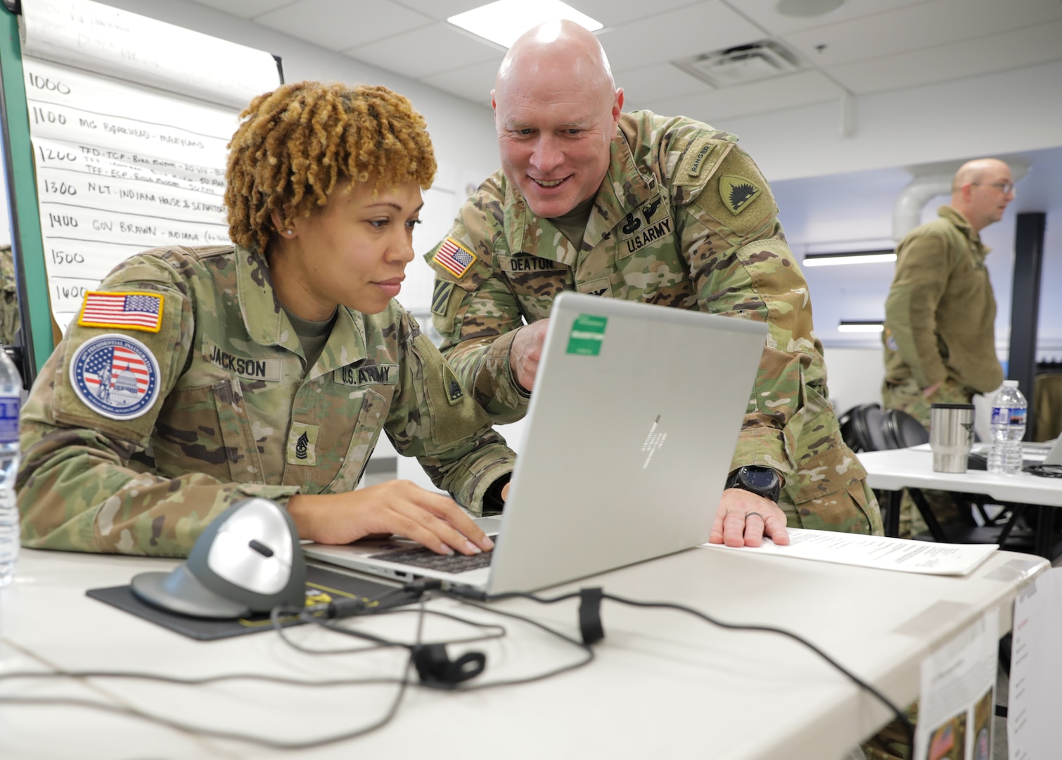 Sgt. Maj. Khalia Jackson, Operations Sergeant Major, 74th Troop Command  Transportation Company, works along side Col. R. Brian Deaton, Chief of Staff for the District of Columbia National Guard in Washington, D.C. during 60th Presidential Inauguration on Jan 19, 2025. Approximately 8,000 National Guard service members from approximately 40 states and territories comprise JTF-DC to support the 60th Presidential Inauguration, continuing a legacy that began in 1789 when their predecessors escorted George Washington to the first inauguration. At the request of civil authorities, these National Guard service members provide critical support such as crowd management, traffic control points, CBRN response, civil disturbance response and sustainment operations. Their expertise and seamless collaboration with interagency partners help ensure a safe and peaceful transition of power during this historic event.