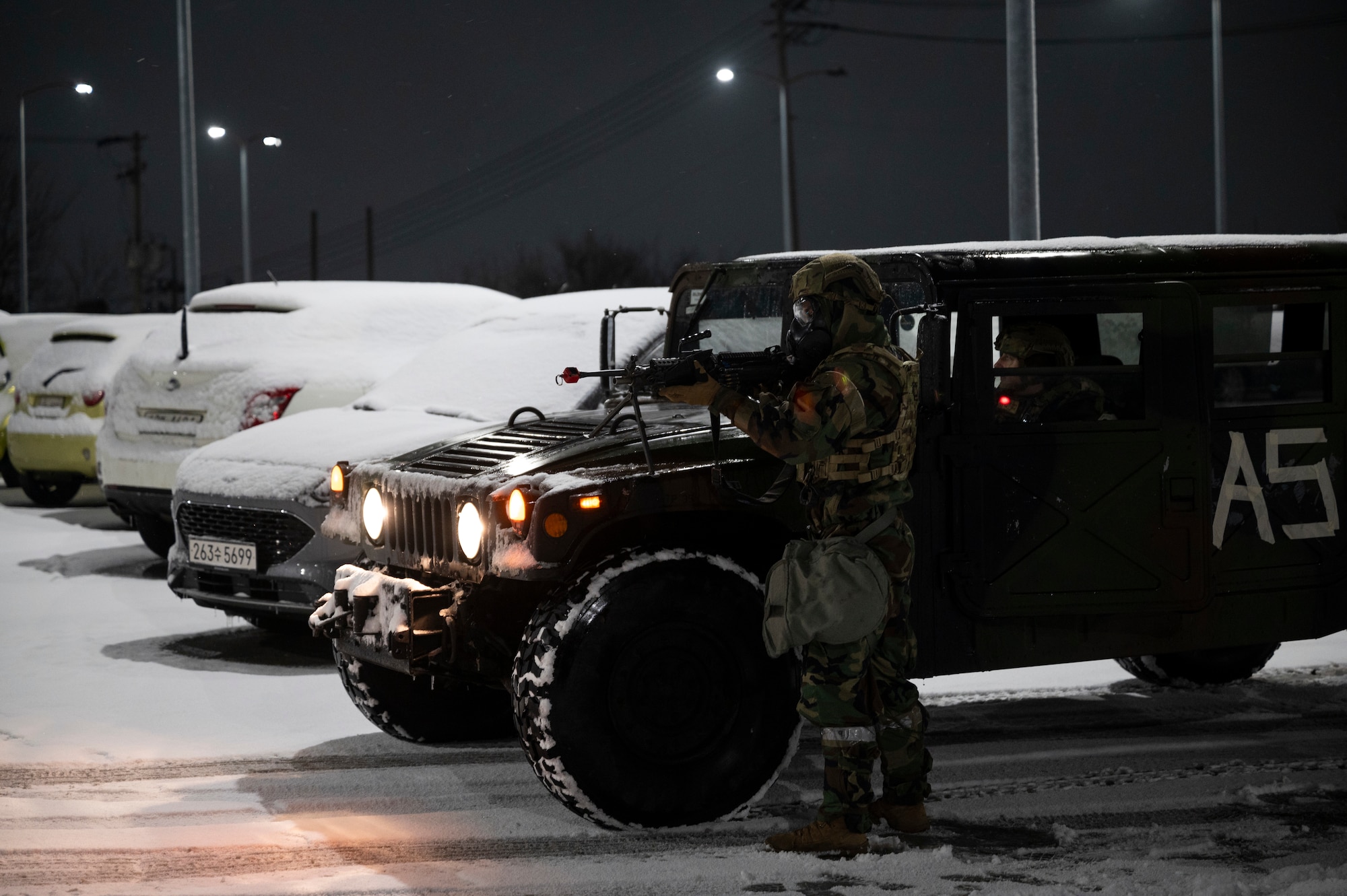 U.S. Air Force Airmen from the 51st Security Forces Squadron patrol the installation during Beverly Herd 25-2 Jan. 27, 2025, at Osan Air Base, Republic of Korea.