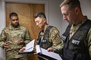 Photo of Airmen speaking