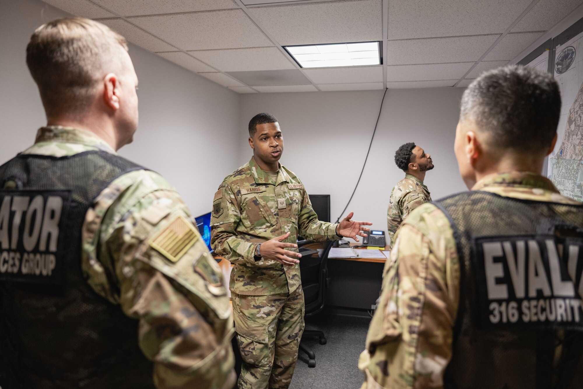 Photo of Airmen speaking