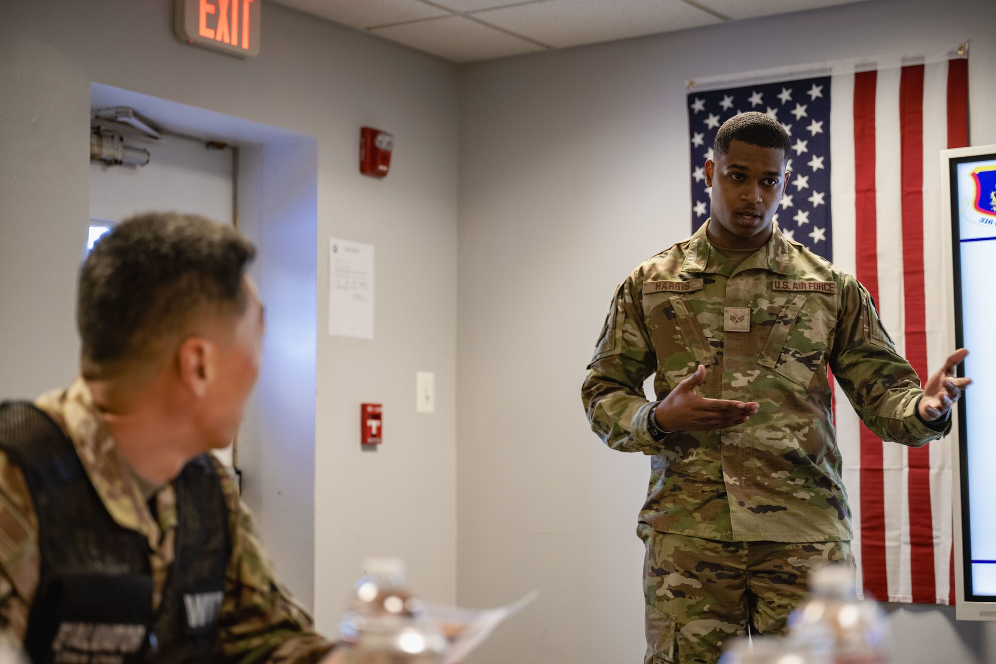 Photo of two men speaking
