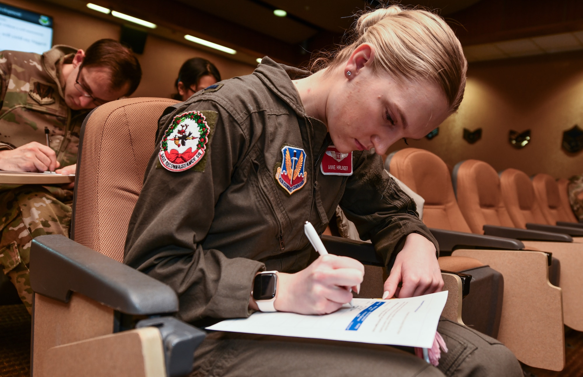 1st Lt. Anne Hirlinger, 343rd Reconnaissance Squadron, fills out a worksheet during the Flight Commanders course at Offutt Air Force Base, Jan. 24, 2025. (U.S. Air Force photo by Chad Watkins)