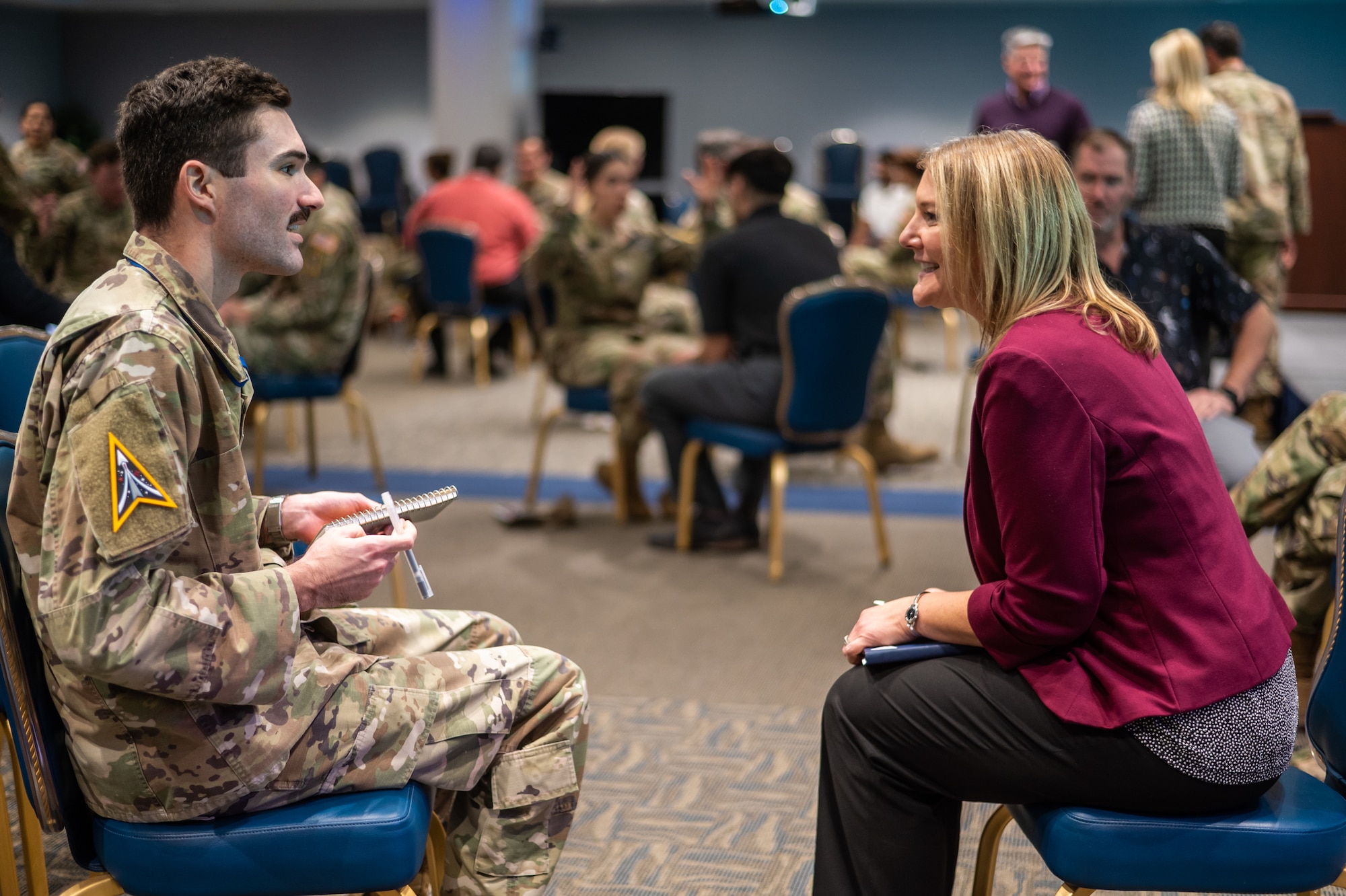 Natalie Riedel, SSC director of Contracting, right, discusses careers with a mentee at the SSC speed mentoring event Jan. 16, 2025 at SSC. Photo by Van de Ha, USSF.