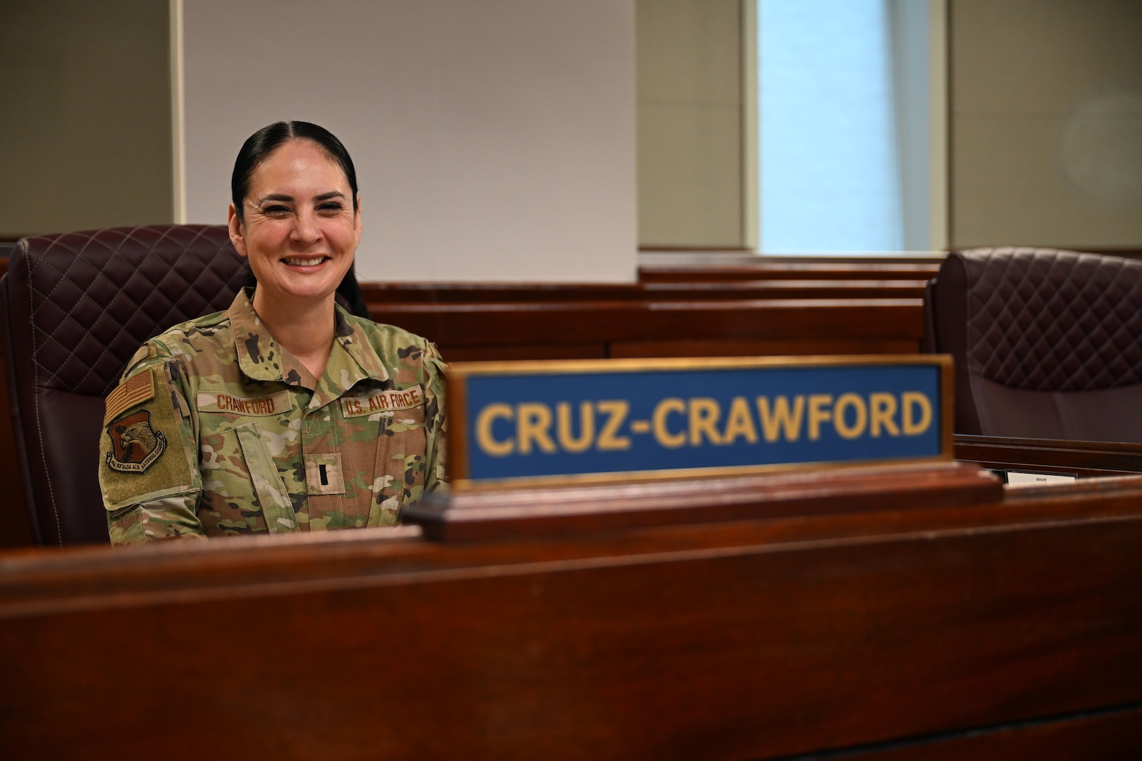 Michelee “Shelly” Cruz-Crawford, a first lieutenant in the Nevada Air National Guard and State Senator in the Nevada Legislature poses for a photo at her desk in the Nevada Senate, Jan. 14, 2025. Cruz-Crawford was elected to the Nevada State Senate last November and is set to take part in her first State Legislative Session, which opens Monday, Feb. 3, and lasts through June.