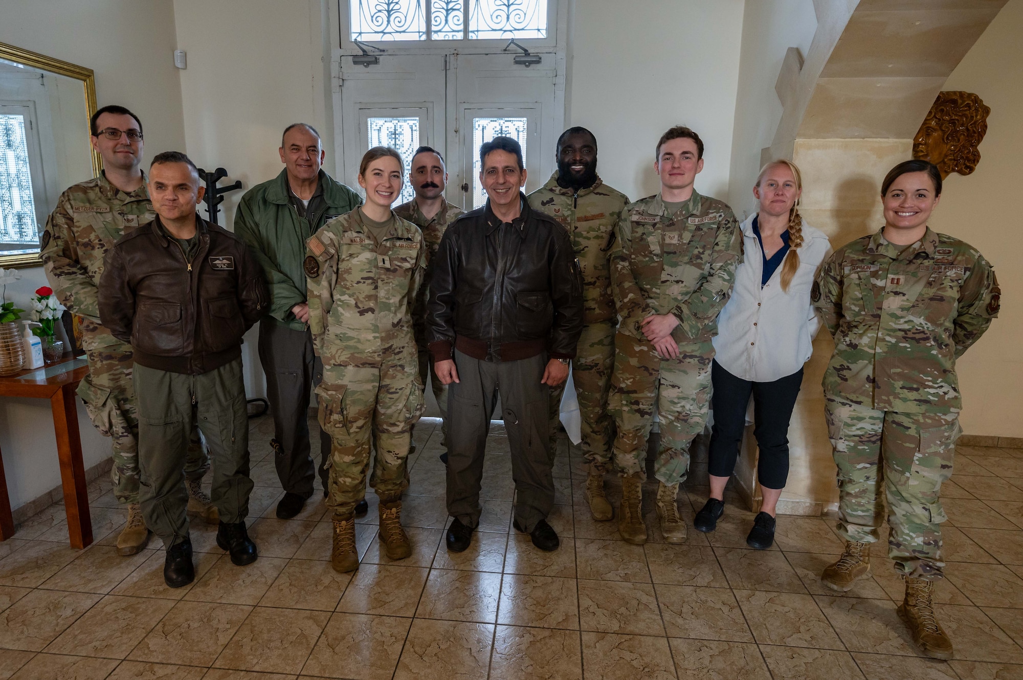 Airmen and Cypriot leadership pose for a photo